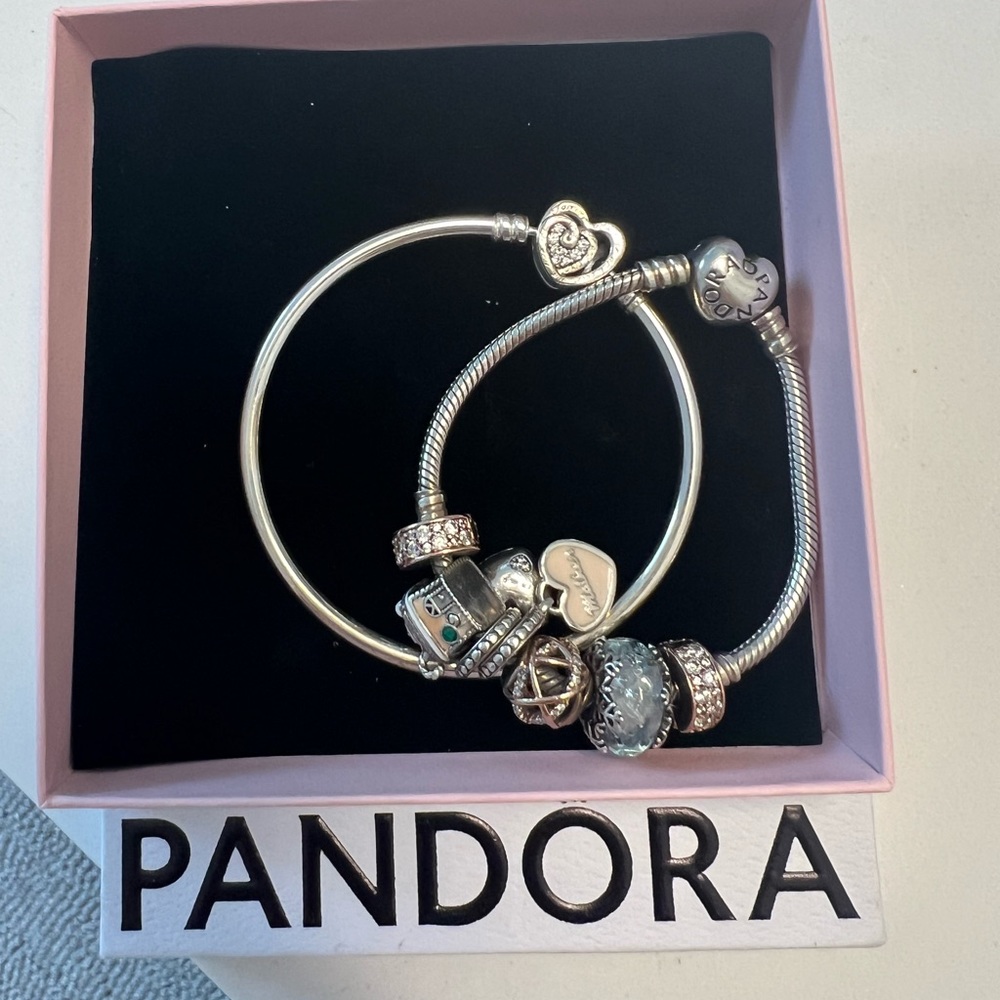 2 Pandora bracelets with charms